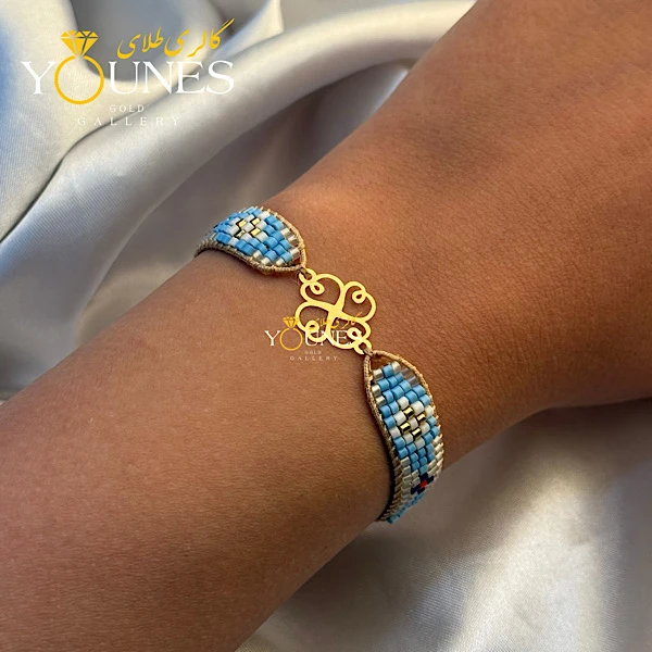 دستبند میوکی آبی چهار پر طلا