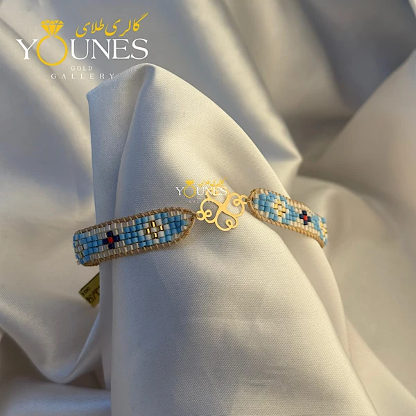 تصویر دوم دستبند میوکی آبی چهار پر طلا